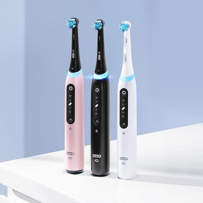 Oral-B iO Series 5 Ultimate White Rechargeable Electric Toothbrush with Visible Pressure Sensor 2 Minute Timer 5 Cleaning Settings 1 Replacement Toothbrush Heads and Travel Case White