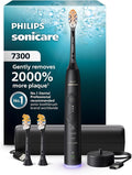 Philips Sonicare 7300 Series Electric Toothbrush - Next-Generation Sonicare Technology Pressure Sensor 12 Brushing Settings SmarTimer BrushPacer 21-Day Runtime Travel Case Black HX7421/07