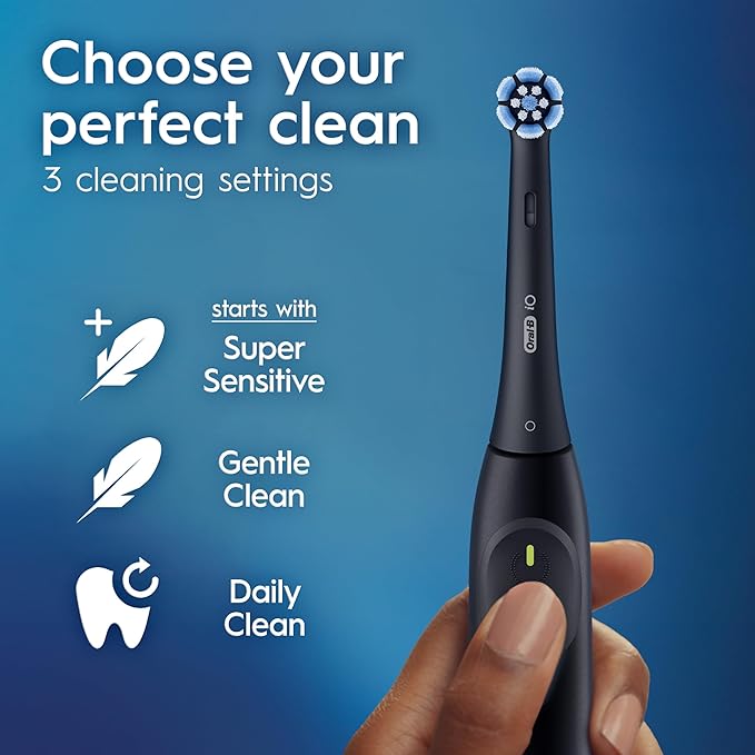 Oral-B Rechargeable Electric Toothbrush iO2 Starter Kit 3 Cleaning Modes Automatic Pressure Sensor to Protect Gums 2 Brush Heads Night Black